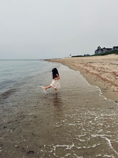 little girl in dress dancng in the ocean shorelines in MA, North Shore Professional Therapy 01731 33326 01950 01810 02456 01983