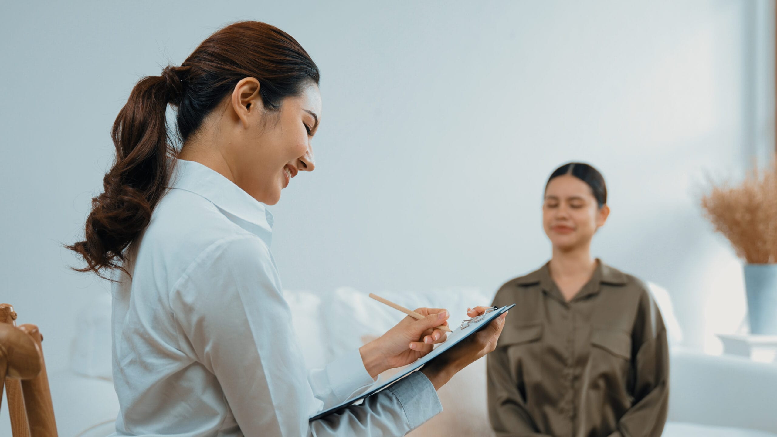 Women sharing a positive conversation in a therapy setting