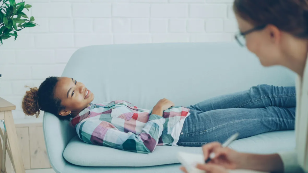 woman on couch starting EMDR therapy for Trauma and Therapy for Anxiety at North Shore Professional Therapy